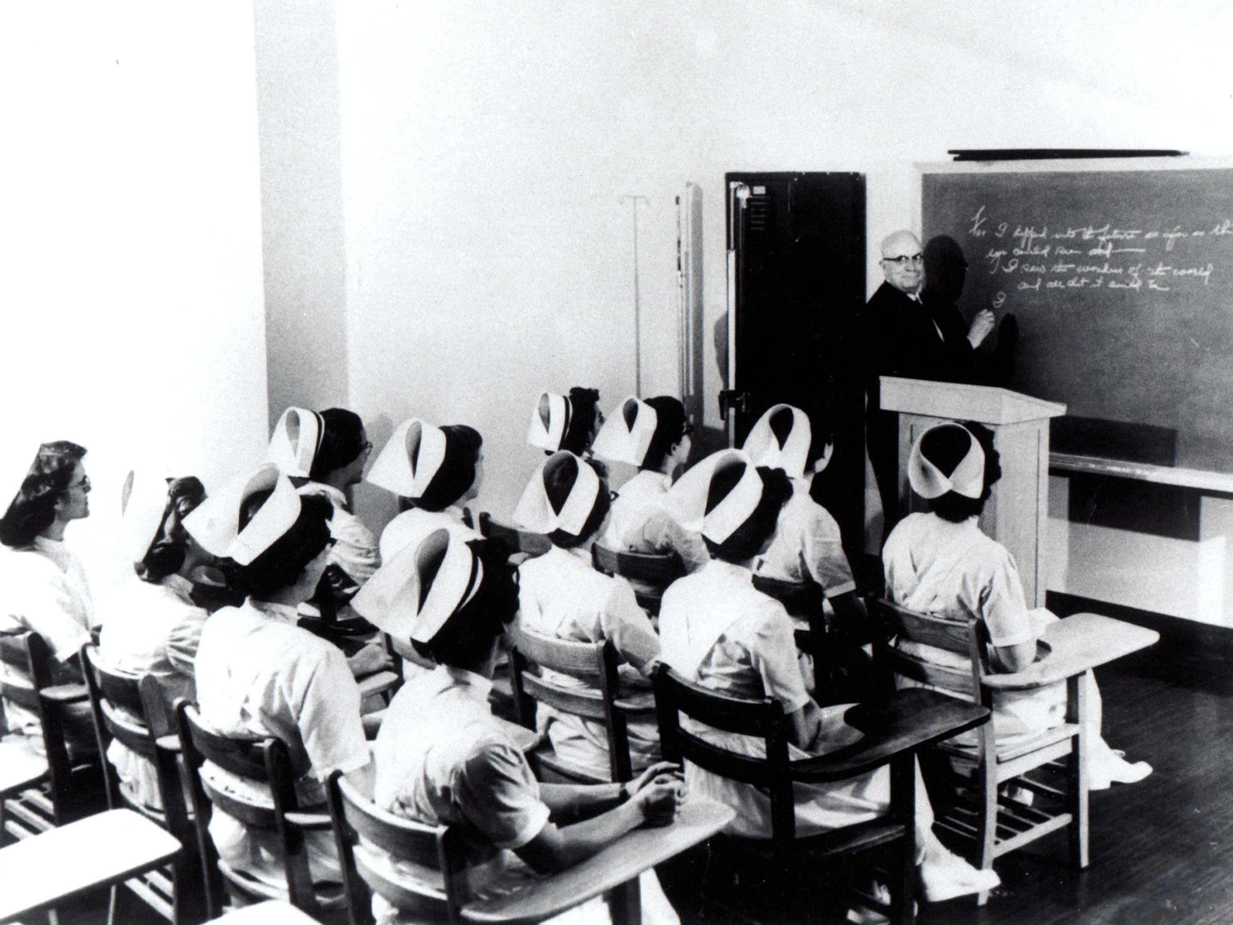 Henry J. Kaiser, Kaiser Foundation School of Nursing, 1953 Henry J. Kaiser, staged photo lecturing at Kaiser Foundation School of Nursing, 1953; Photo #1520
